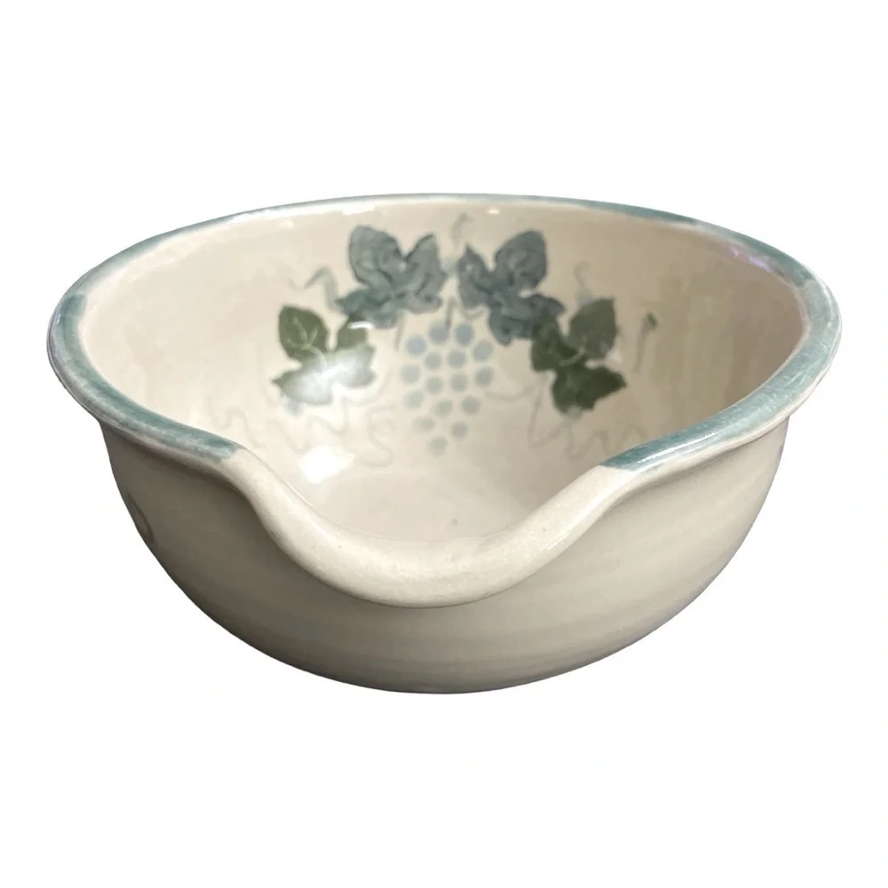 Handmade Bowl w/ Grape vines/ leaves. Singed by artist. Handle/ lip for pouring